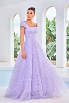 Embrace the vision of beauty and charm in this ballgown evening dress adorned with ruffled floral appliques. The gown features a square neckline, a wide waistband, and cap sleeves for a timeless appeal. The midrise v-shaped cut at the back reveals a hint of skin and is secured with a center zipper closure. The full-length skirt sculpts a ballgown silhouette, adding a touch of grandeur to your look. Jadore Dress, Floral Evening Gown, V Shape Cut, Modest Prom, Prom Dresses Modest, Full Length Skirts, Evening Dresses For Weddings, Dress Order, Dress Purchase