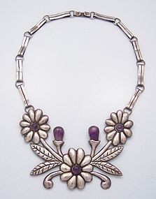 Repousse Floral Amethyst Vintage Mexican Silver Necklace     For more information on this necklace view at LOOK AT THAT NECKLACE on Trocadero.com Energy Shift, Firefly Jewelry, Vintage Mexican Jewelry, Mexican Silver Jewelry, Pewter Jewelry, Vintage Silver Jewelry, Boho Jewellery, Jewelry Drawing, Mexican Jewelry