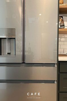 a stainless steel refrigerator with the word cafe on it's front and side doors