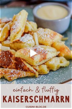 some food is on a plate with powdered sugar