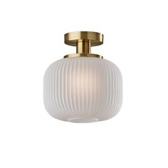 a light fixture with a white glass ball on the top and gold trimmings