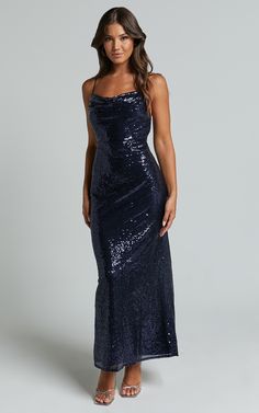 Stand out from the crowd in our Cynthie Midi Dress - Strappy Cowl Neck Sequin Slip Dress In Navy. This formal dress is perfect for those special occasions when you want to make a statement. The sequin detailing catches the light just right, while the cowl neck adds an elegant touch. Made from polyester, this sleeveless midi dress is both comfortable and stylish. Whether you're attending a wedding or hitting the dance floor at a party, this navy dress will have heads turning and jaws dropping. Em Sequin Slip Dress, Blue Sparkly Dress, Wedding Fits, Disco Wedding, Winter Dance, Dresses Sequin, Style Formal, Sequin Gown, Sleeveless Midi Dress