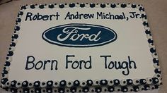 a birthday cake with the ford logo on it