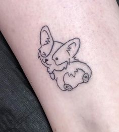 a small koala tattoo on the ankle