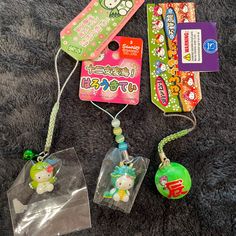 Hello Kitty Keychain Bundle (1) Hk Dressed As Some Sort Of Bird With Cherry Blossom (2) Hk Dressed As A Dragon (3) This One Is A Kaleidoscope That Has Little Jewels Inside, Has Hk On It Dressed As A Dragon Iphone Cable Protector, Sanrio Green, Keychain Bundle, Sanrio Accessories, Hello Kitty Crochet, Anniversary Keychain, Hello Kitty Keychain, Mobile Wallet, Cute Bedroom Ideas