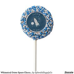 a blue and white lollipop with space on it