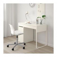 a white desk with a chair next to it