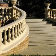 the stairs are made of stone and have balconies on each handrails