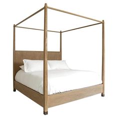 a four poster bed with white sheets and pillows on it's headboard, against a white background