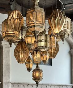 a chandelier hanging from the ceiling in a room