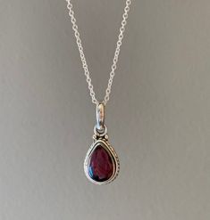 Sterling silver teardrop Garnet necklace. Ideal gift for her.Matching earrings available. Silver Teardrop Birthstone Drop Necklace, Gift Sterling Silver Teardrop Pendant Drop Necklace, Silver Pear-shaped Necklace For Gift, Pear-shaped Silver Necklace For Gift, Silver Pear-shaped Necklace Gift, Silver Pear-shaped Drop Necklace Gift, Silver Teardrop Drop Necklace Gift, Sterling Silver Teardrop Necklace For Her, Teardrop Sterling Silver Necklace As Gift For Her