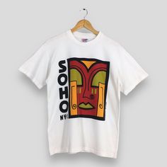 Vintage 90's Soho Nyc Pop Art White T shirt Medium Anastaciou For Nyart Soho Nyc South of Houston Artwork Printed New York City Tees Size M by slayvin on Etsy Soho Nyc, Used Clothing, White T Shirt, White Tshirt, White T, Soho, Vintage Clothing, Artwork Prints, Houston