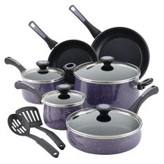 a set of purple pots and pans with black handles