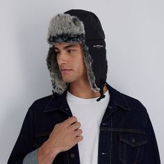 Superior warmth is effortless with this men's faux-fur trapper hat from Levi's. Superior warmth is effortless with this men's faux-fur trapper hat from Levi's. FEATURES 2-in. brim Faux-fur lining for maximum warmth and heat retentionAdjustable web chin strap fabric with plastic clip buckleAdjustable ear flaps for flexible wearEmbroidered Levi Strauss & Co logo detail on left exteriorWater-resistant exterior shellFABRIC & CARE Spot clean Nylon, polyester Size: S/M. Color: Black. Gender: male. Age Fur Hat Men, Fur Trapper, Fur Trapper Hat, Co Logo, Trapper Hat, Trapper Hats, Plastic Clips, Fur Hat, Levi Strauss & Co