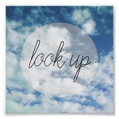 the word look up written in black ink on a blue sky background with white clouds