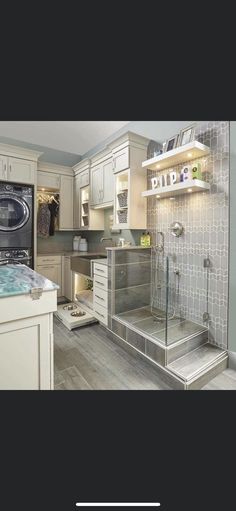 an image of a bathroom setting with bathtub, sink and washer in it