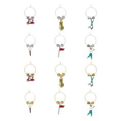 six key chains with charms hanging from them