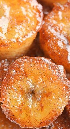 some sugar covered donuts sitting on top of each other