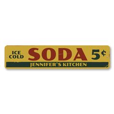 a yellow and green soda sign with the words soda 5 cents in red on it