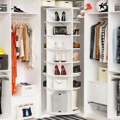 a white closet filled with lots of different types of shoes and handbags on shelves