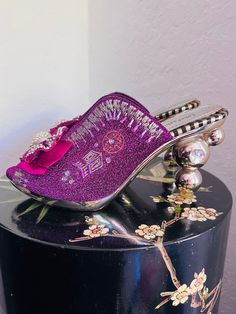 "Embroidered & beaded silken mules in varying shades of purple with crystal embellished raspberry colored ribbon rosettes, slightly flared upper, stacked bubble detail mirrored gold acrylic 4\" heels with large inset acrylic rhinestone. Ribbed rubber outsole prevents slips.  Marked a size 11, but actual fit is for a size 9.5M (please see measurements for accurate sizing). Gently used condition with some scuffs to gold finish in some places on lower footbed side of heel (see closeup);  a couple r Ribbon Rosettes, Clogs And Mules, Raspberry Color, Clogs Shoes, Shades Of Purple, Gold Finish, Heeled Mules, Raspberry, Etsy Accessories