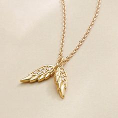 Introducing our exquisite Diamond Angel Wings Pendant Necklace in 14K Solid Gold – a symbol of divine protection and timeless elegance. This guardian angel necklace, adorned with diamonds, serves as a beautiful and meaningful piece of jewelry.Crafted with meticulous attention to detail, the angel wings pendant features sparkling diamonds set in a solid 14K gold setting. The design captures the ethereal beauty of angel wings, symbolizing protection, guidance, and a connection to something greater Angel Wings Pendant, Angel Wings Necklace, Ethereal Jewelry, Diamond Angel, Guardian Angel Necklace, Angel Wings Jewelry, Gold Pendent, Wings Pendant, Divine Protection