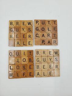 four scrabble tiles with words on them that spell out the names of beer