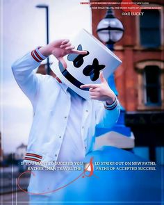 a man in a white jacket is holding up a box with a panda face on it