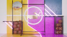 there is a basketball hoop in front of a wall with the word puma on it