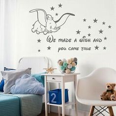 a child's bedroom with a wall decal that says we made a wish and you came true