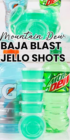 several plastic cups with the words mountain dew baua blast jello shots on them