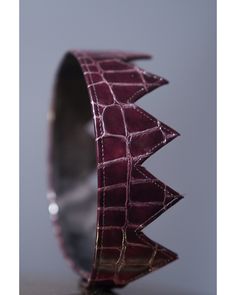 The Kodsi Crown Dark Burgundy Crocodile Leather One size fits all Unisex EST. SHIPPING: 3-5 DAYS Crown Dark, Leather Crown, Dark Burgundy, Crocodile Leather, Leather Cap, Skull Cap, Gold Leather, One Size Fits All, Cuff Bracelets