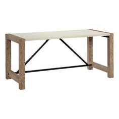 a white table sitting on top of a wooden floor