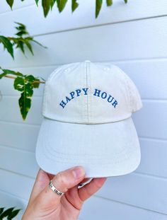 Happy Hour Baseball Hat - Color: beige and blue - Adjustable Strap on the back - Unisex - Embroidered - Makes as a great gift - Free Shipping on orders of $35+ Everyday Fun Hats With Curved Brim, Fun Everyday Hat With Curved Brim, Fun Curved Brim Hat For Everyday Use, Adjustable Cream Hat For Gift, Adjustable Cream Hat For Gifts, Adjustable Cream Hat As Gift, Beige Curved Brim Hat With Letter Print, Cute Cream Hat For Gift, Baseball Season Trucker Hat For Beach