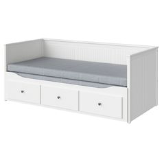 a white daybed with three drawers and a mattress on the bottom shelf, in front of a white background