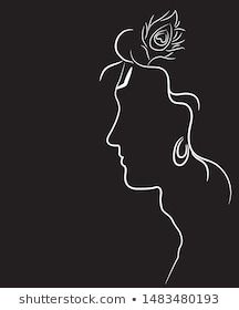 the silhouette of a woman with a flower in her hair