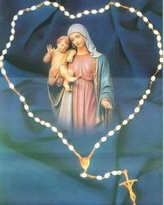 an image of the virgin mary and child jesus in a heart shaped light - up