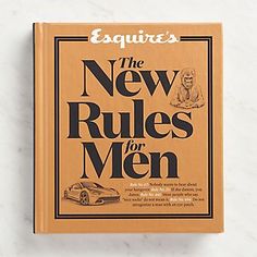 esqquites the new rules for men book on marble counter top with white background