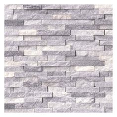 a white brick wall that is made out of grey marble