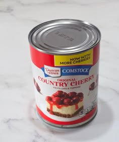 a can of cake sitting on top of a white counter