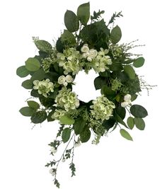 a wreath with white flowers and green leaves