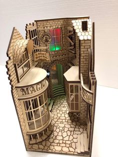 a paper model of a building with windows and doors