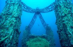 an underwater view of a large structure in the ocean