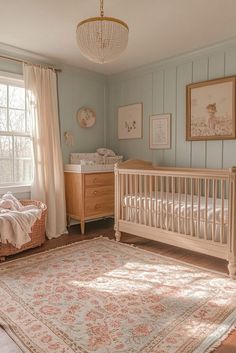 a baby's room with a crib, dresser and bed in the corner