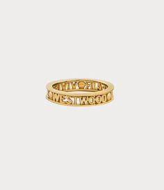 The Vivienne Westwood Westminster ring is named after the esteemed Westminster district in London, renowned for its rich history and cultural importance. The piece receives a silhouette crafted from recycled silver, adorned with a gold-tone finish that elegantly encircles the slim lettering logo on the band. Gold Vivienne Westwood, College Wishlist, Vivienne Westwood Ring, Expensive Taste, The Vivienne, Ringe Gold, Lettering Logo, Jewelry Lookbook, Backpack Travel Bag