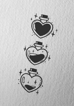 two heart shaped teapots are shown in black ink