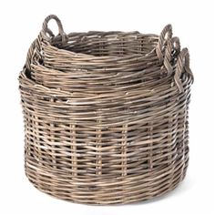 a round wicker basket with handles on the top and bottom, sitting in front of a white background