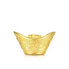 a gold bowl on a white background