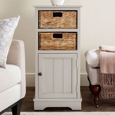 a white cabinet with wicker baskets on it and a chair in the corner next to it