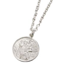 This gorgeous Men's St Christopher Necklace is made by our jewellers from 925 Sterling Silver.This necklace features an embossed Saint Christopher coin. Saint Christopher is the patron saint of all travellers. This necklace makes the perfect gift for any travel fan.Made from: This necklace is made from 925 sterling silver.Dimensions: Disc is approx. 1.6cm diameter and 1mm thick. Chain is 18" Long. Each item is individually handmade to order in our Brighton workshop. All of our items are handmade Sterling Silver Engraved Spiritual Coin Necklace, Spiritual Sterling Silver Engraved Coin Necklace, Silver Coin Necklace With Polished Finish As Gift, Sterling Silver Hallmarked Medallion Coin Necklace, Necklace For Men Silver, St Christopher Necklace, Posh Totty, St Christopher, Saint Christopher